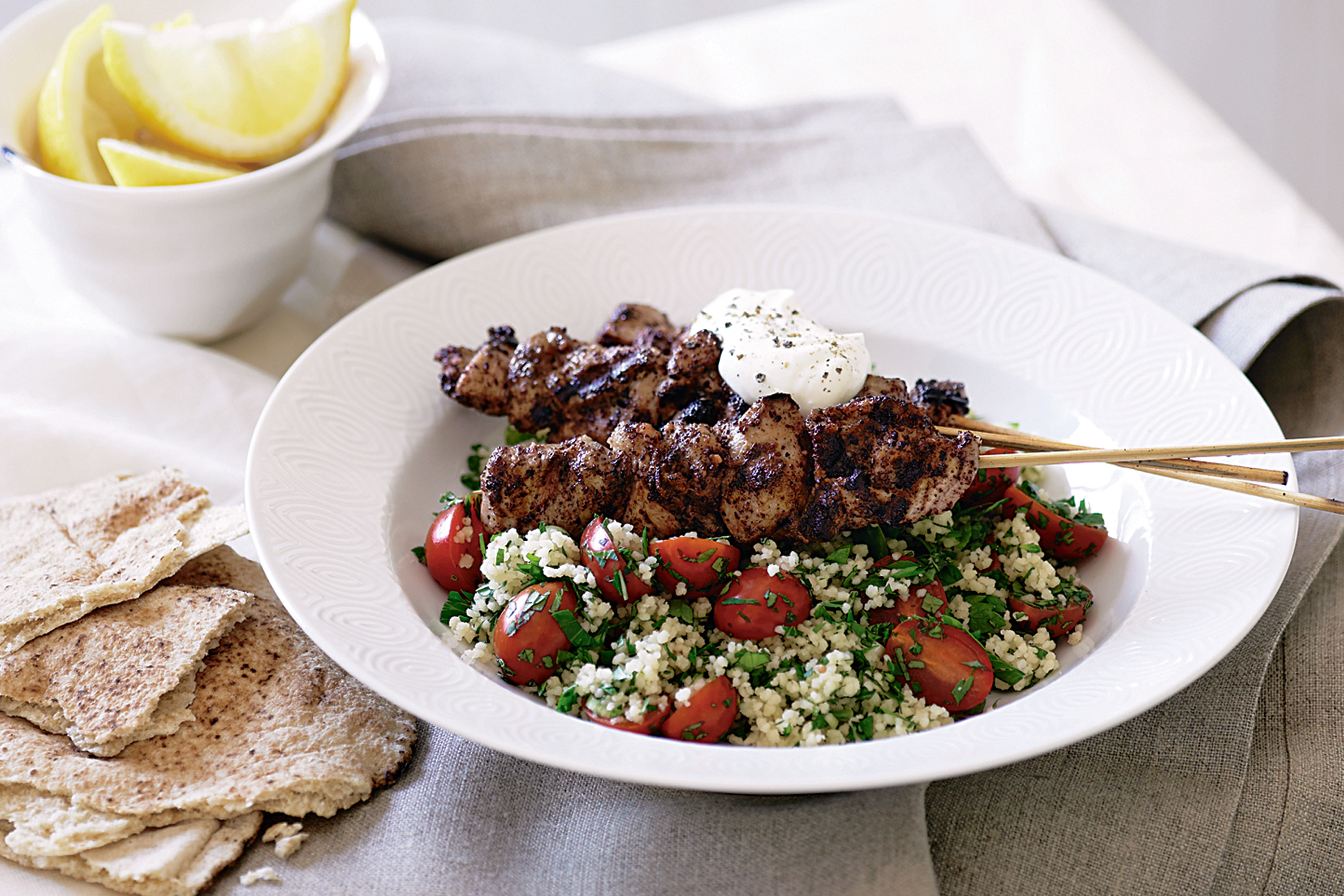 Beef kebab with couscous and garlic sauce